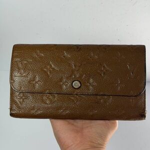 Louis Vuitton Virtuose Wallet Crafted Brown Monogram Empreinte Leather